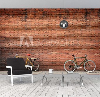 Picture of Retro bicycle on roadside with vintage brick wall background